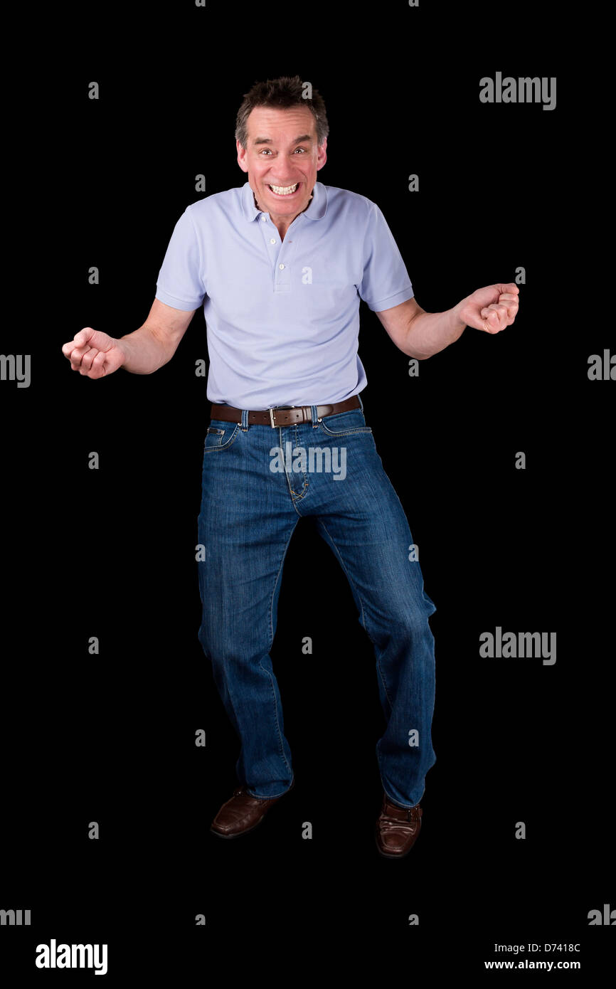 Funny Middle Age Man Dancing with Cheesy Grin Black Background Stock Photo