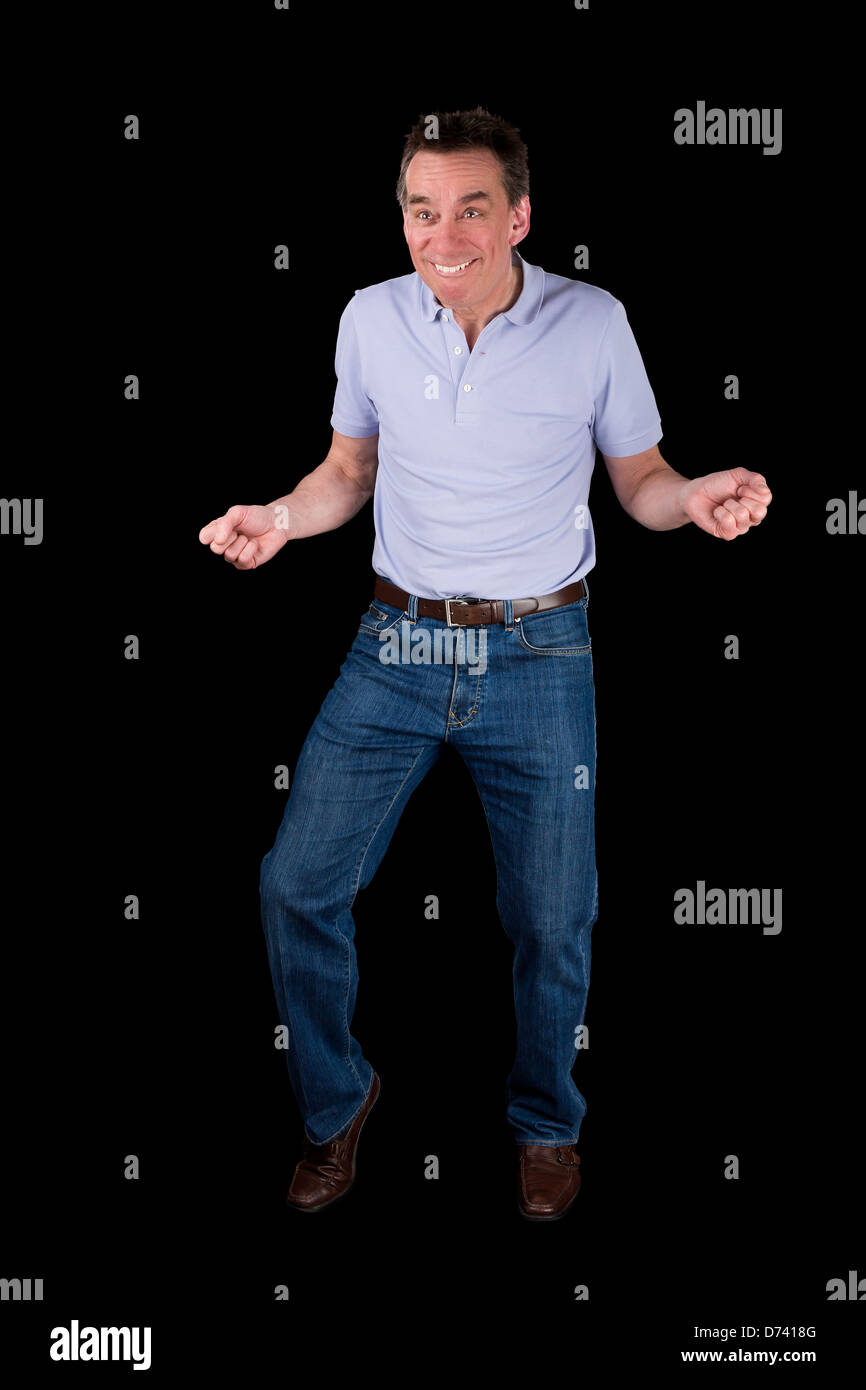 Funny Middle Age Man doing Silly Dance Black Background Stock Photo
