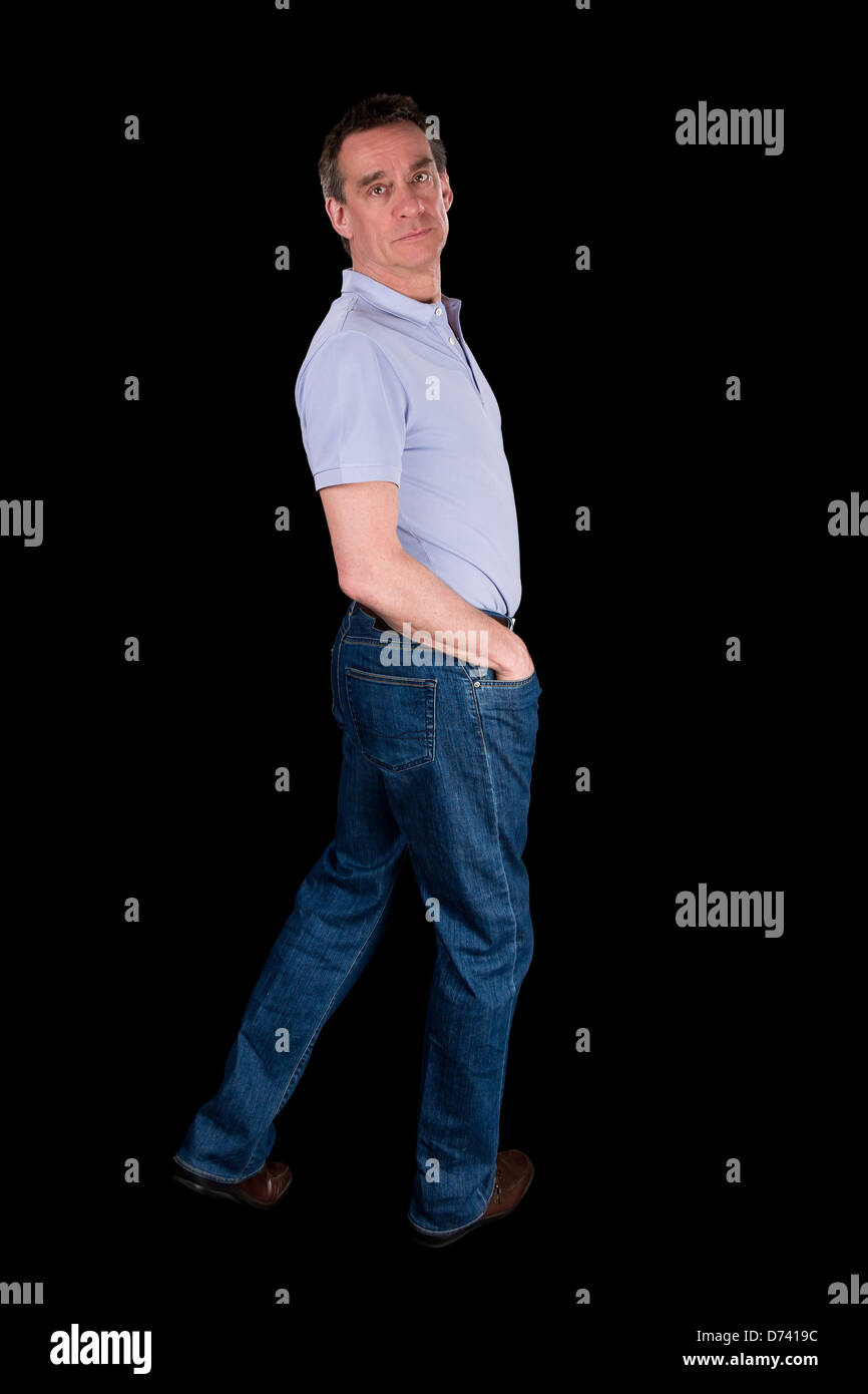Middle Age Man Looking Backwards Over Shoulder Black Background Stock Photo