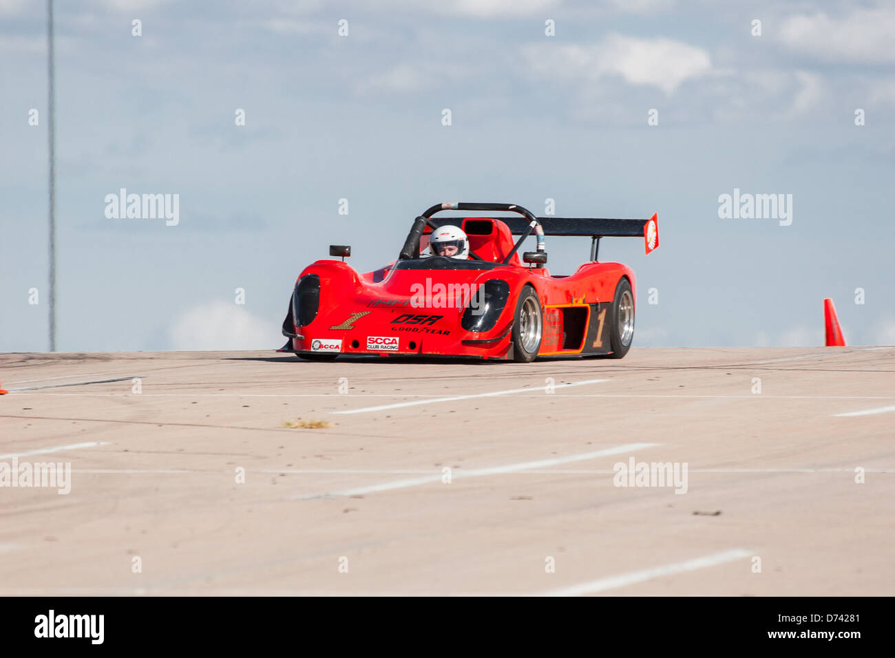 A 2000 Orange Radical ProSport BModified open wheel race car in an
