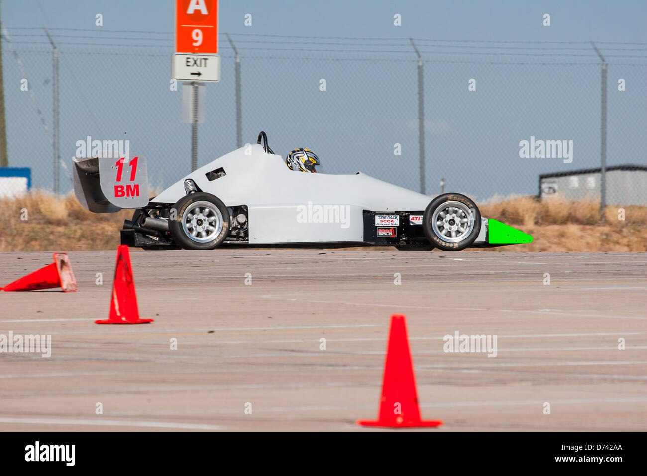 A 2002 Pocket Rocket DC2 gray BModified open wheel race car in an