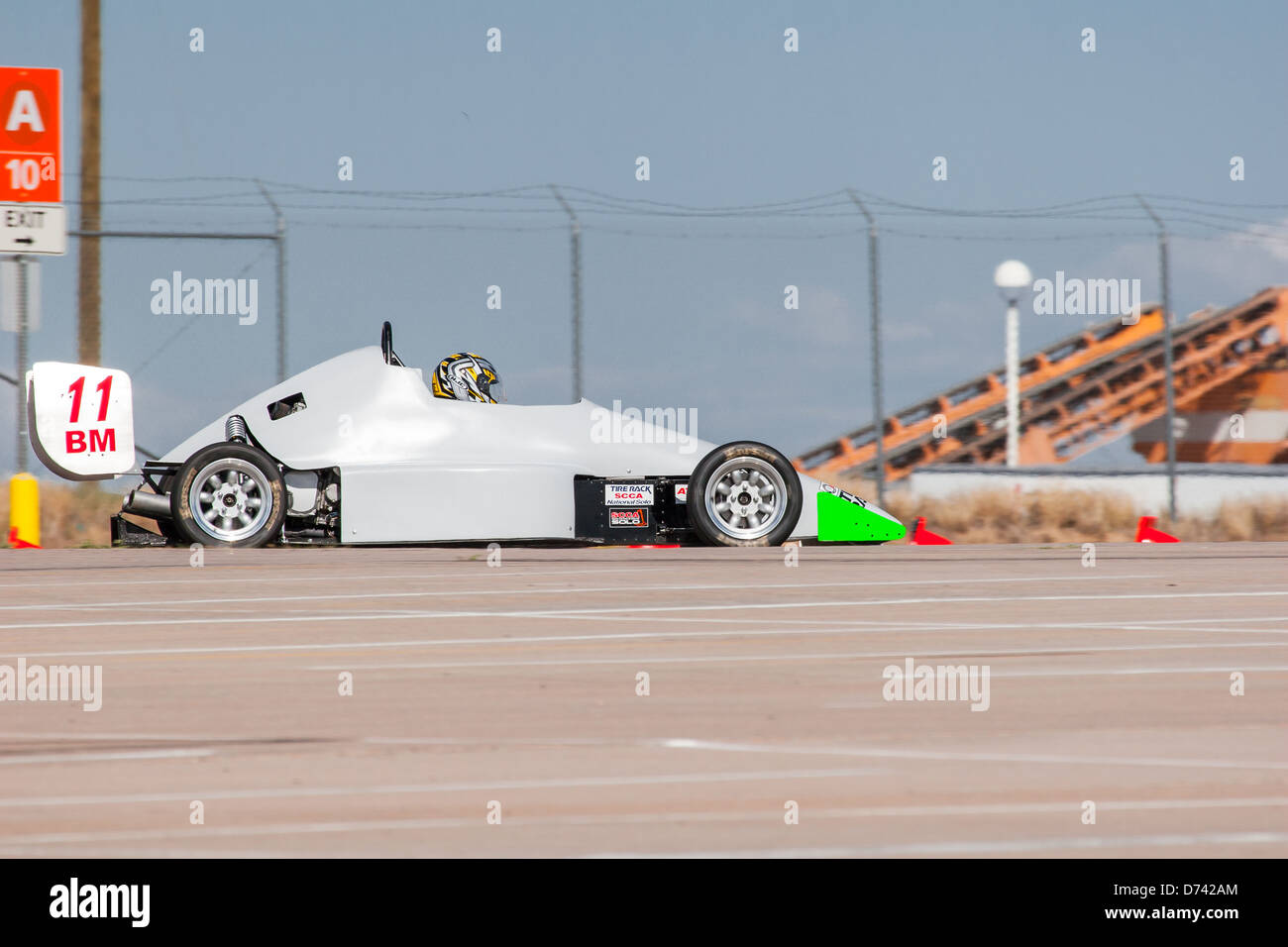 A 2002 Pocket Rocket DC2 gray BModified open wheel race car in an