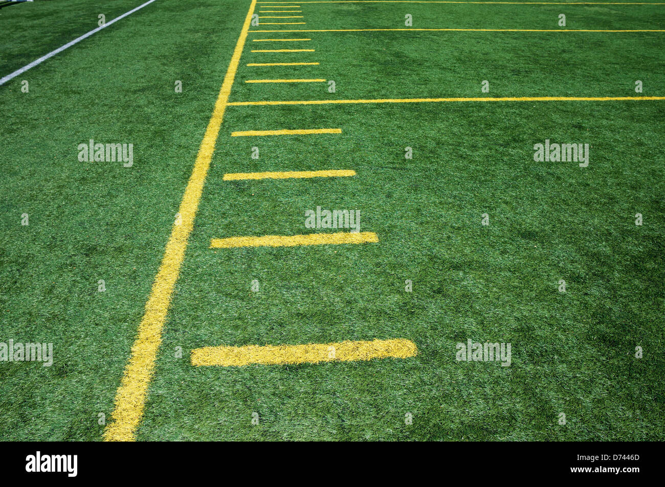 Sideline on American Football artificial turf field with hash marks. Stock Photo