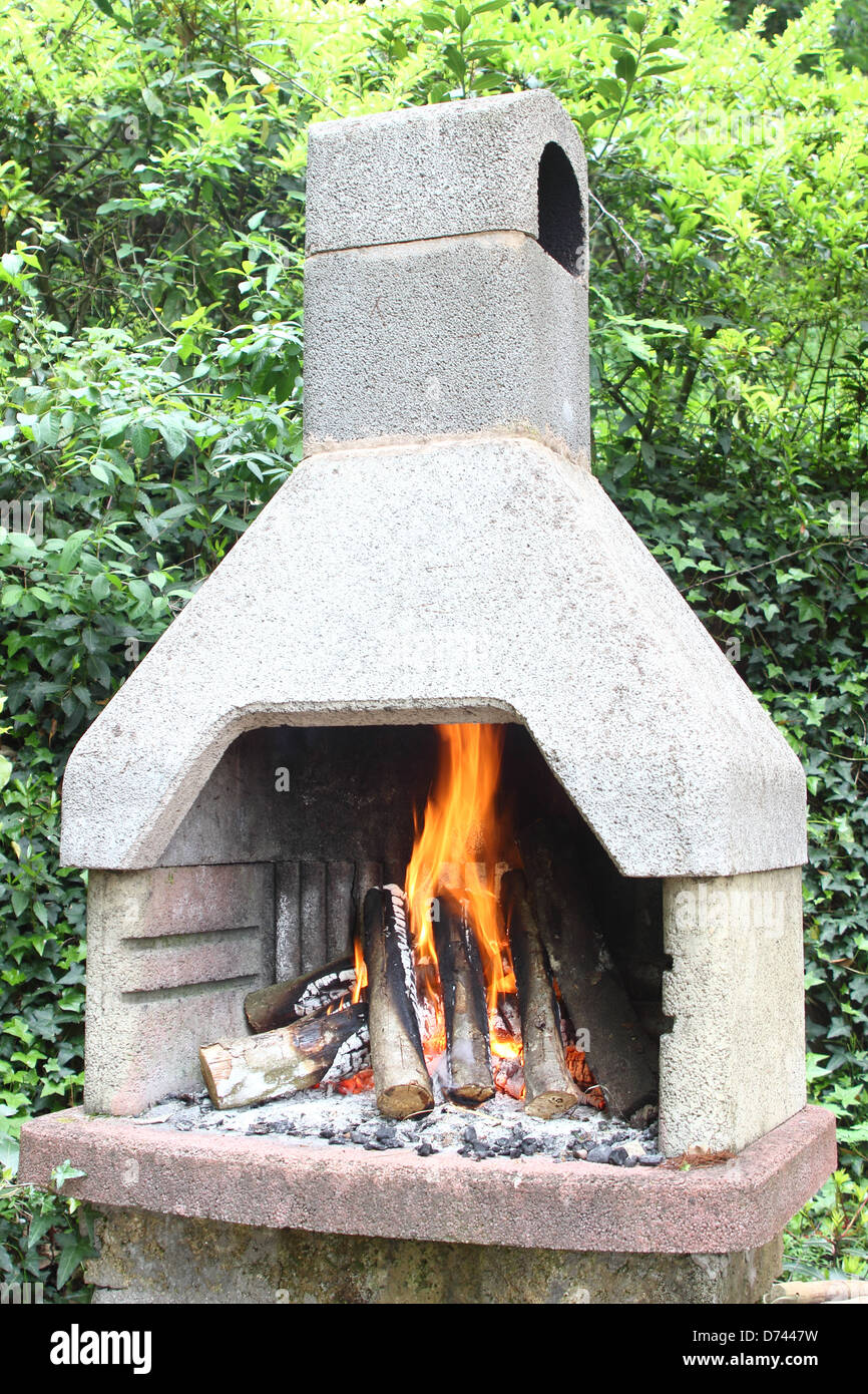 Outdoor Fireplace With Trunk Fire For Bbq Stock Photo 56024861