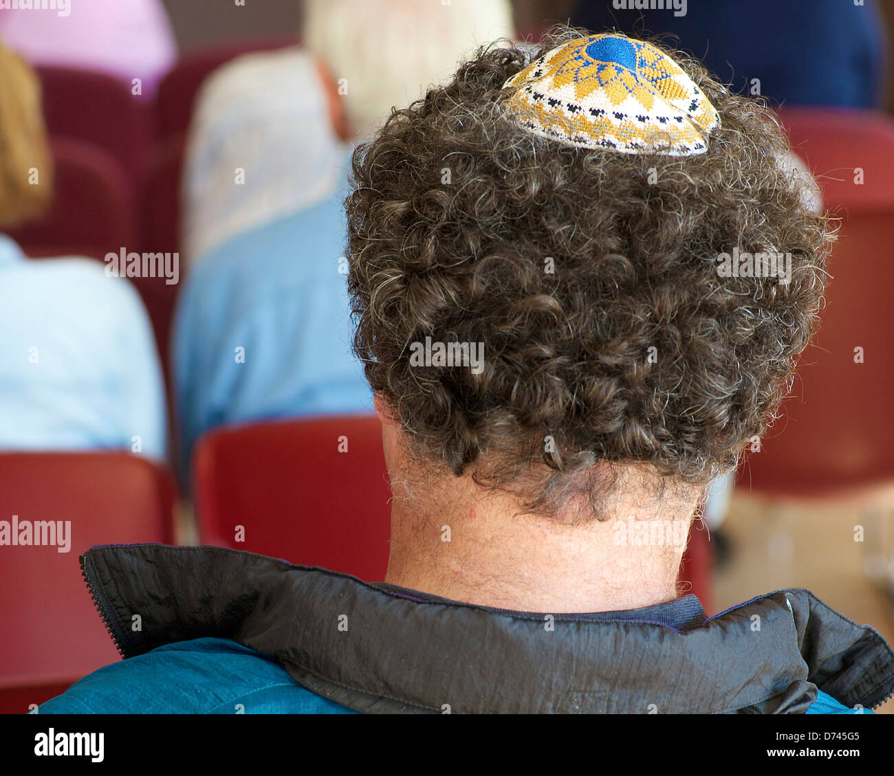 A jewish person wears a yamaka, (kippah) at a synagogue Stock Photo Alamy