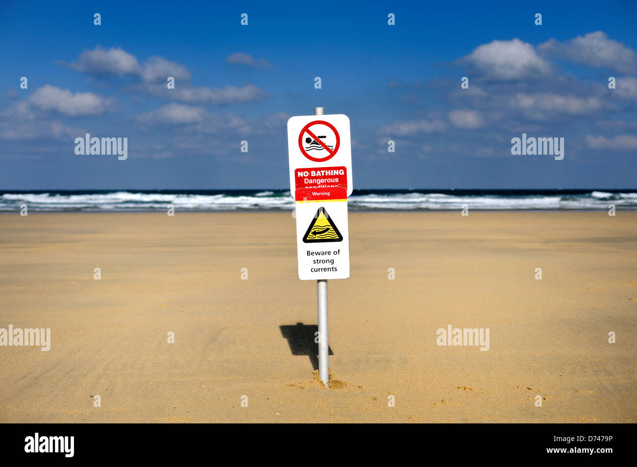 Warning sign for dangerous sea and strong currents Stock Photo