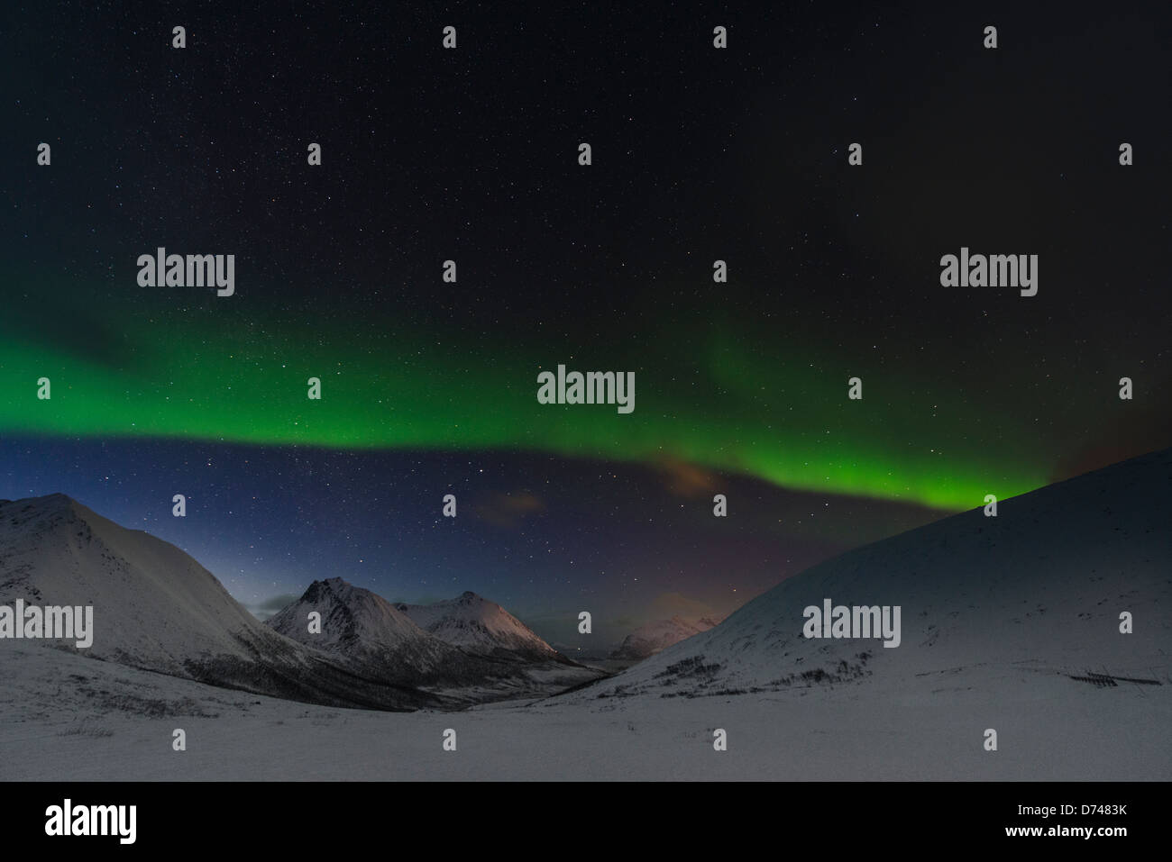 Northern Lights dancing over the hills in Norway Stock Photo - Alamy