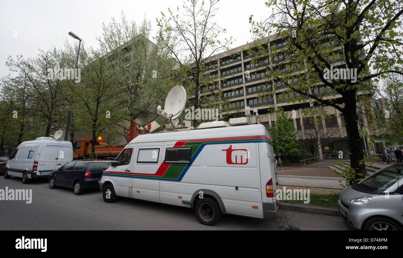 Outside broadcasting vans park in front of the criminal justice centre Nyphenburger Strasse in Munich, Germany, 29 April 2013. The seats for people of the press attending the NSU-muder trial are defined by lottery on the same day. Photo: PETER KNEFFEL Stock Photo
