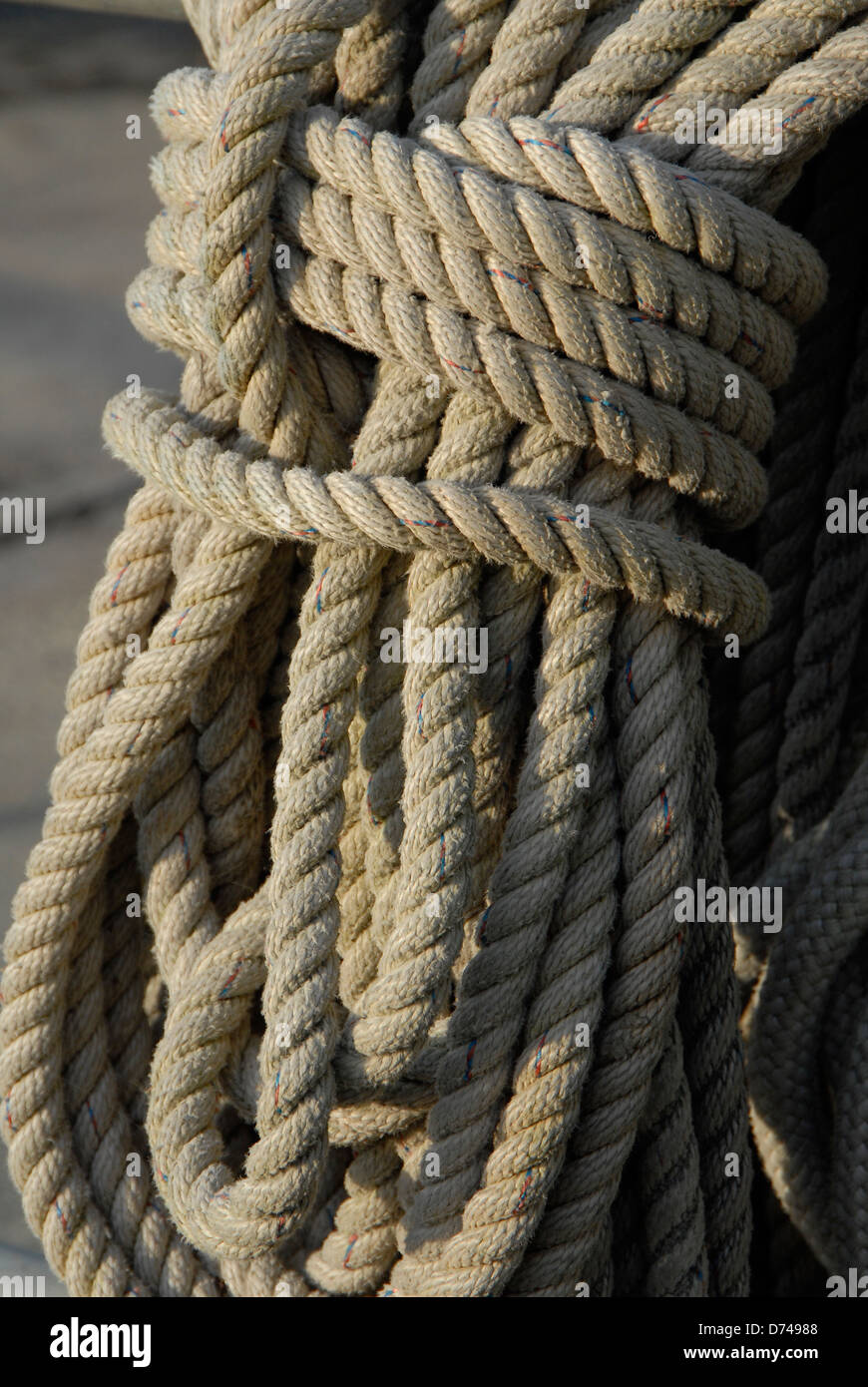 Sunlight on coiled rope mooring lines Stock Photo Alamy
