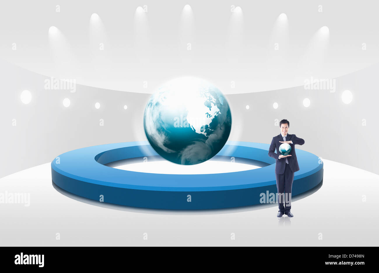 businessman standing with globe in front of a circular graph Stock ...