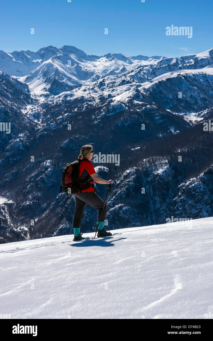 Female Figure In Red Snowshoeing Plateau De Beille Ariege French