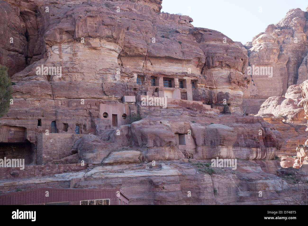 Carvings in the stone cliff, in Petra, Jordan; a first century lost city in the Middle East and a travelers adventure Stock Photo