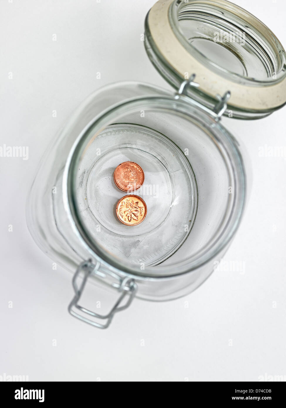 two pennies in a jar Stock Photo