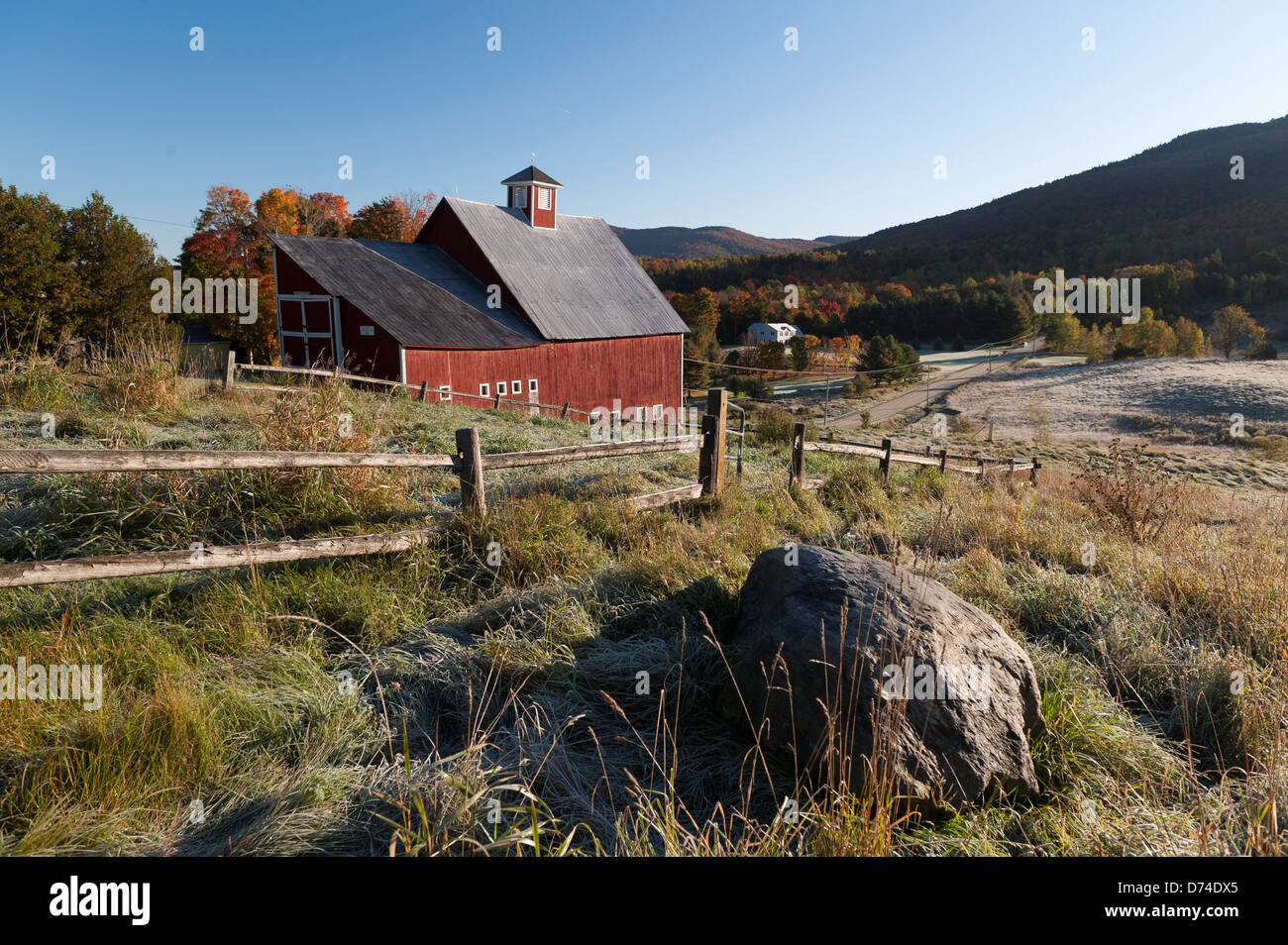 USA, Vermont, Stowe, Red barn during fall foliage Stock Photo