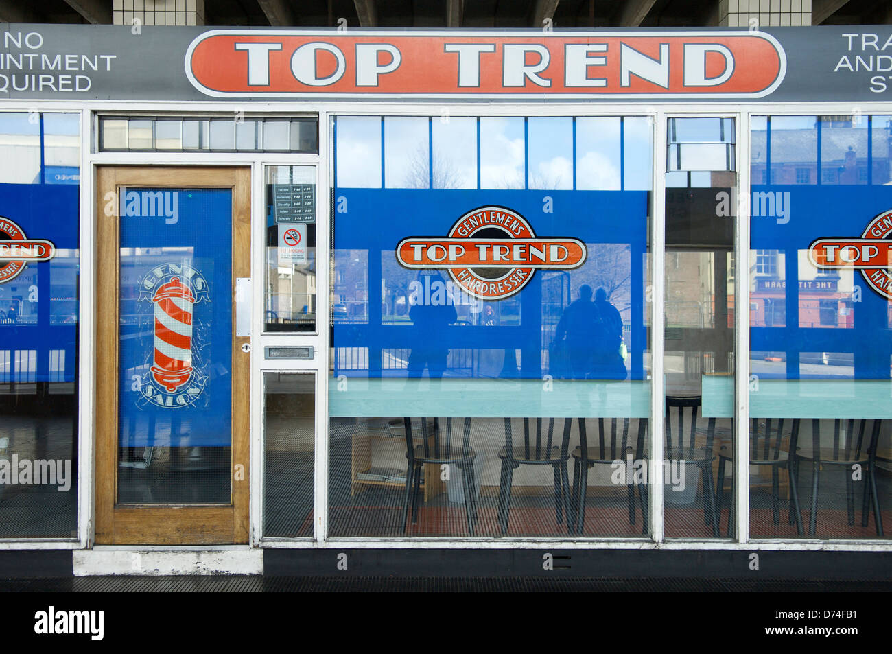 front window of mens hairdressers Stock Photo