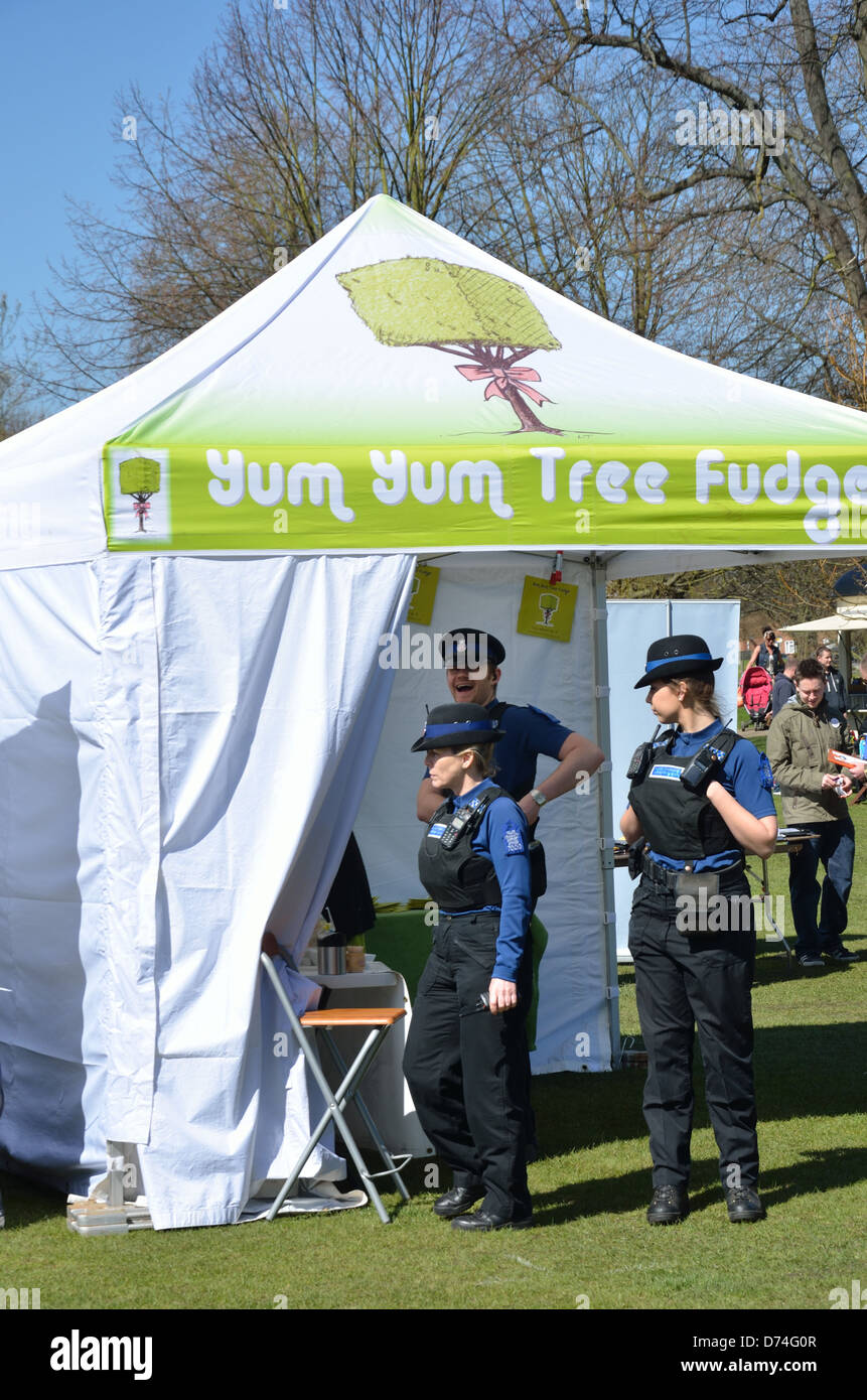 Police under canopy Stock Photo