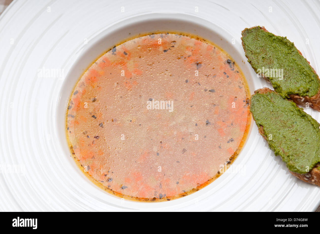 classic Italian minestrone " passato"soup with pesto crostini on side