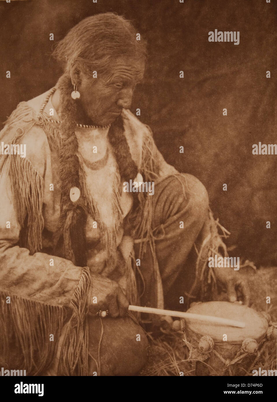 The 'Peyote Drummer' photograph captures a cultural and ceremonial ...