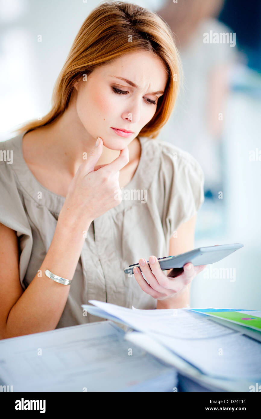 Woman with administrative papers Stock Photo - Alamy