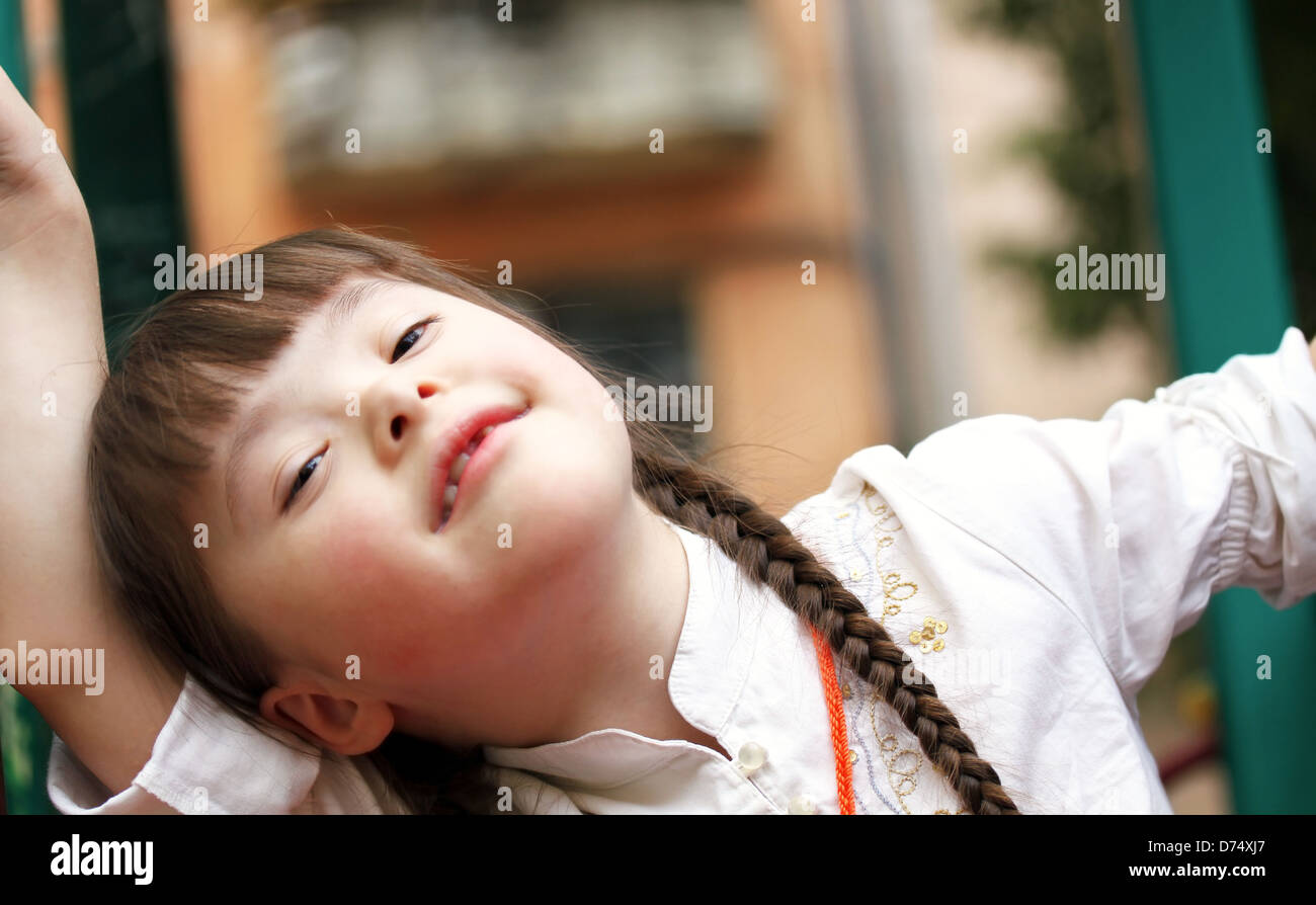 Portrait of happy little girl on the playground Stock Photo - Alamy