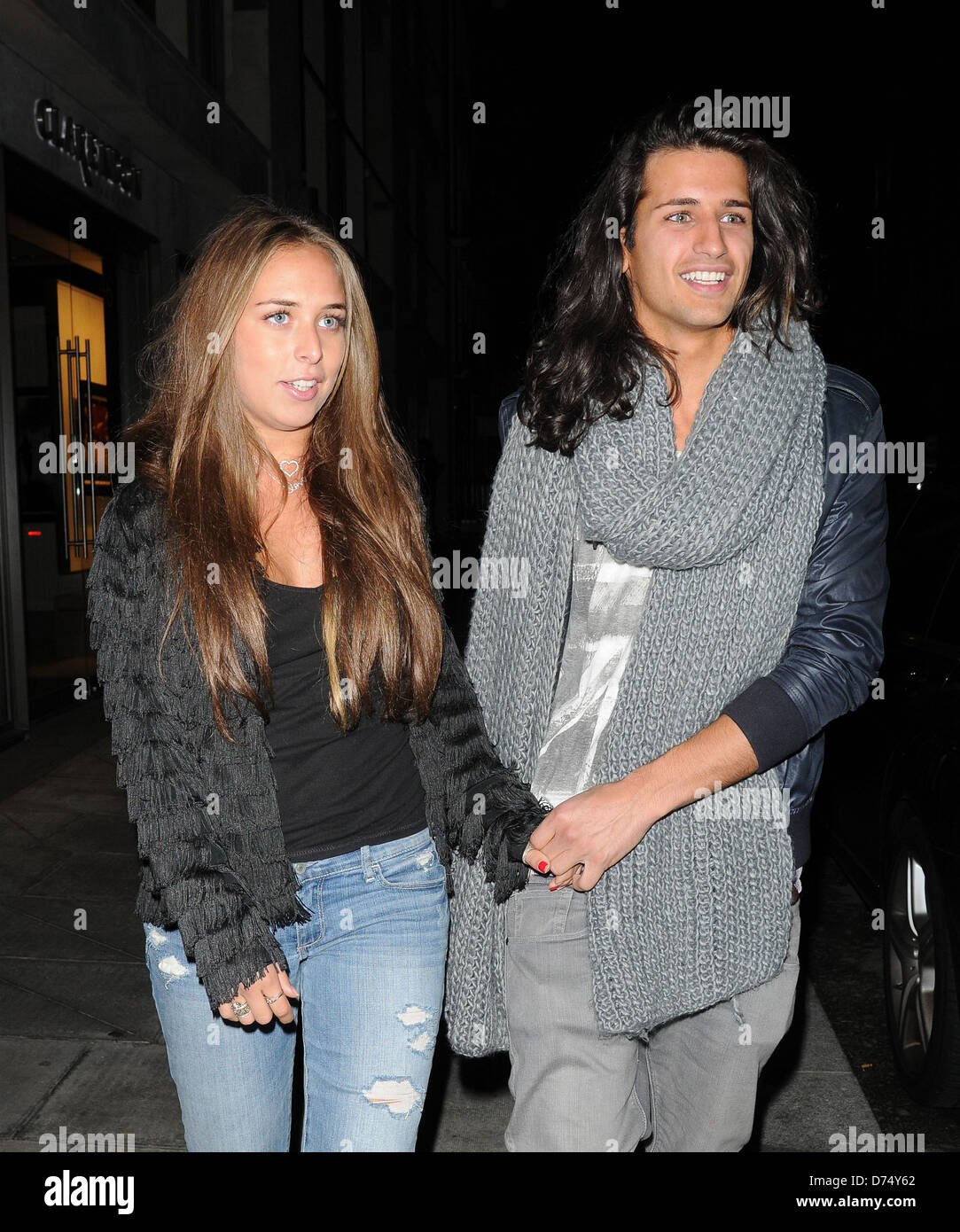 Made in Chelsea's Ollie Locke and socialite Chloe Green, daughter of Topshop  boss Philip Green, walk hand-in-hand as they leave Stock Photo - Alamy