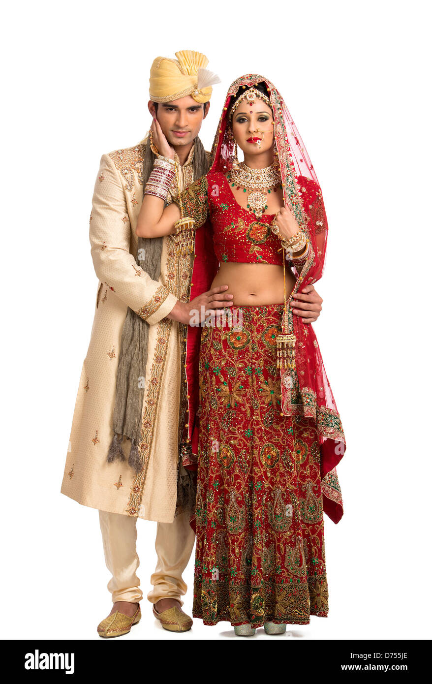 Indian newlywed couple in traditional wedding dress Stock Photo ...