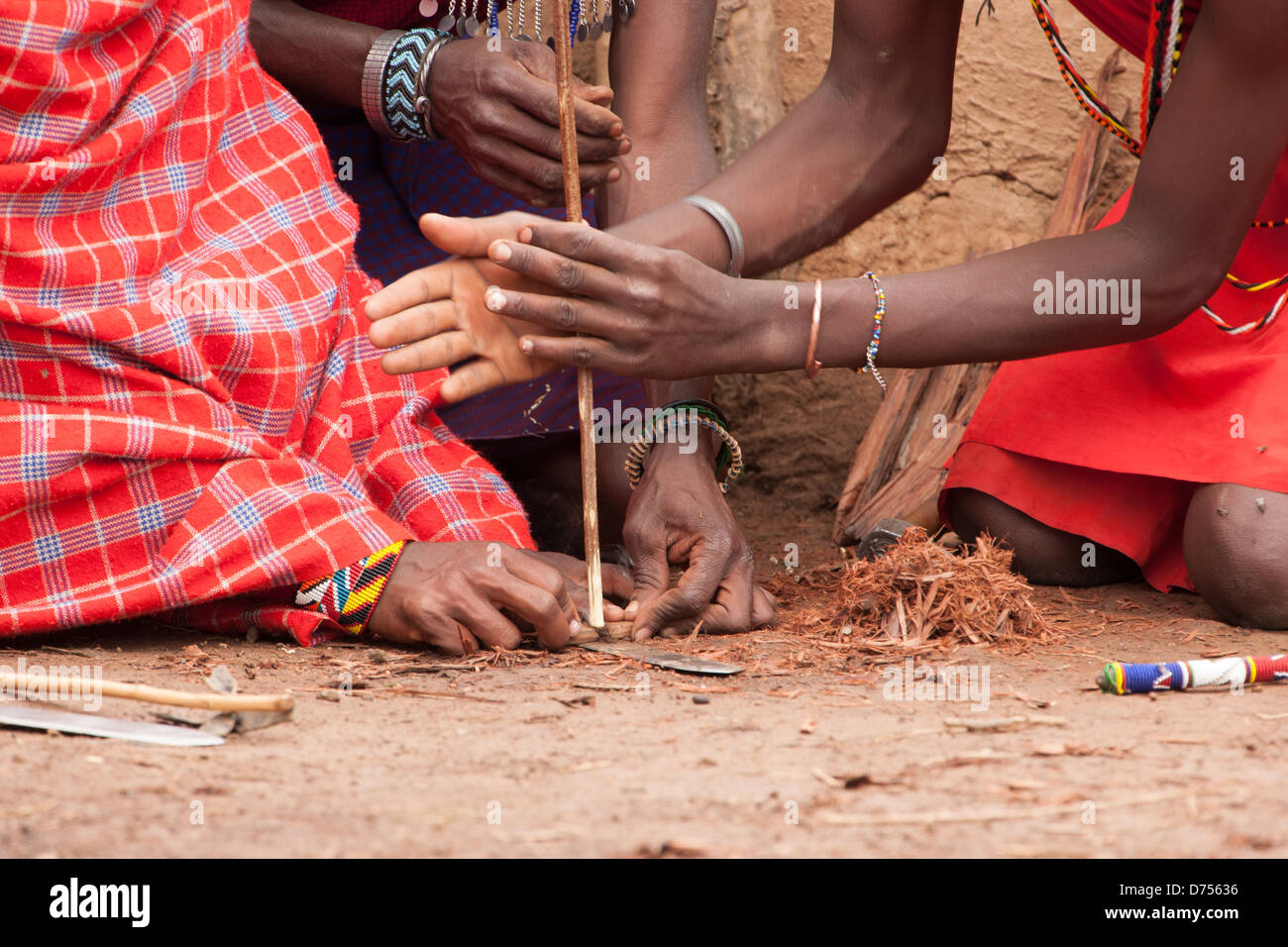 Maasai Tribemen Making Fire Stock Photo