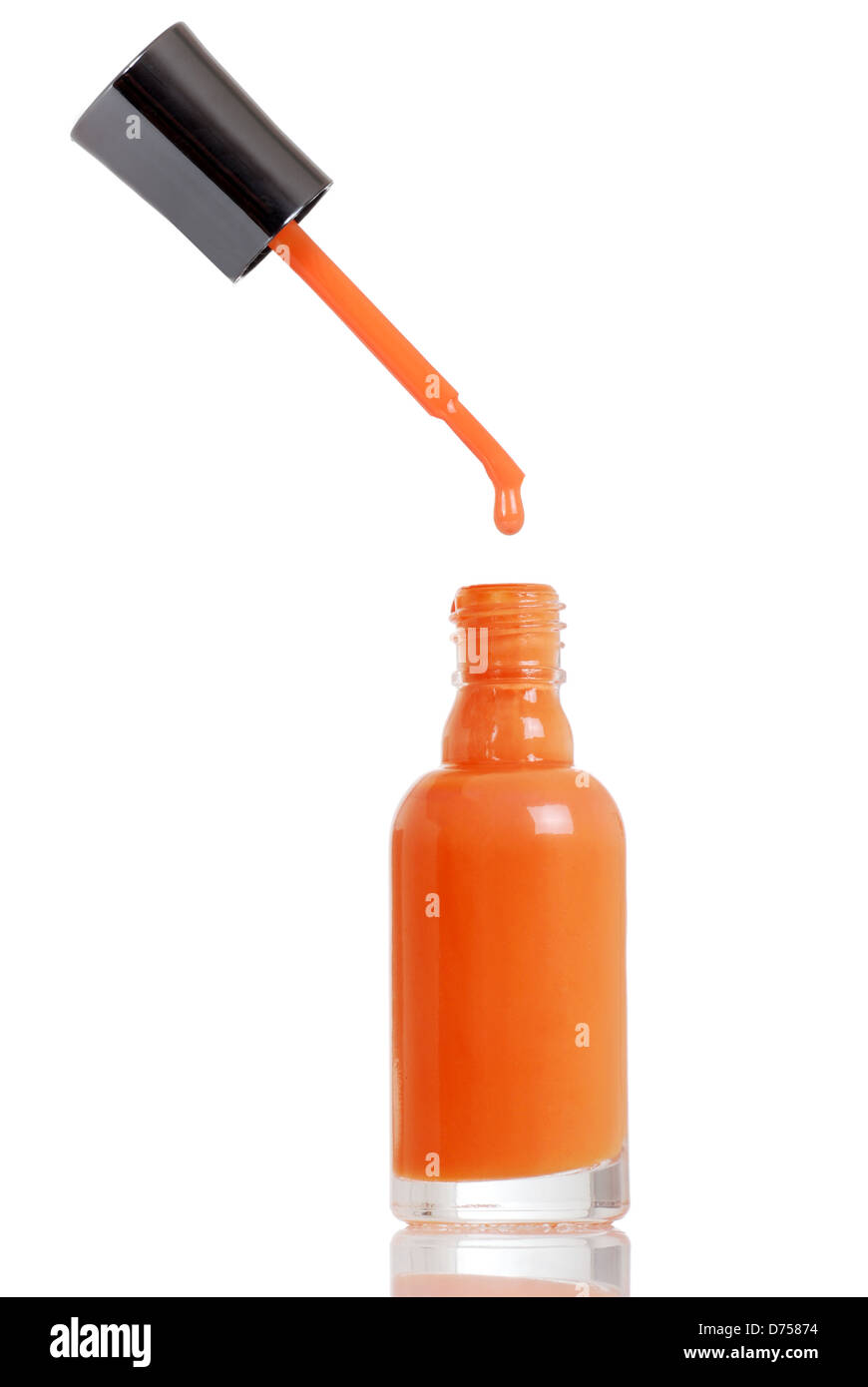 Orange nail polish dripping Stock Photo
