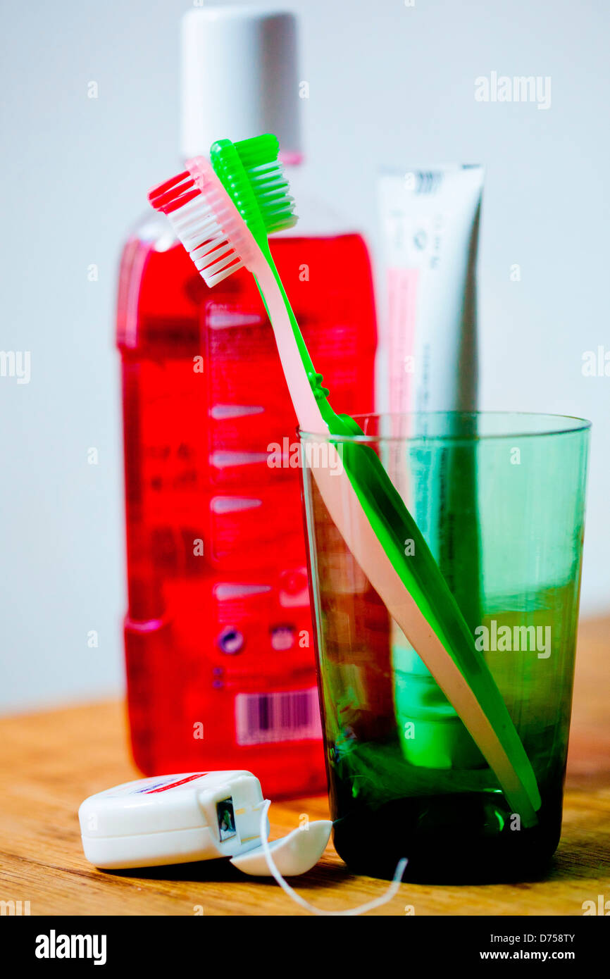 Mouthwash, dental floss, toothbrushes and toothpaste Stock Photo Alamy