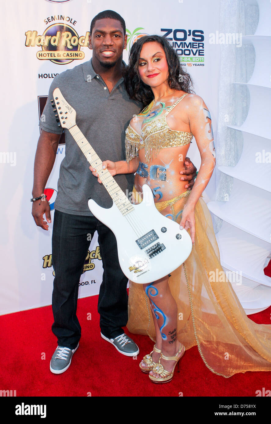 Jonathan Vilma, Suki Jaafar at Zo's Summer Groove Hard Rock Hotel
