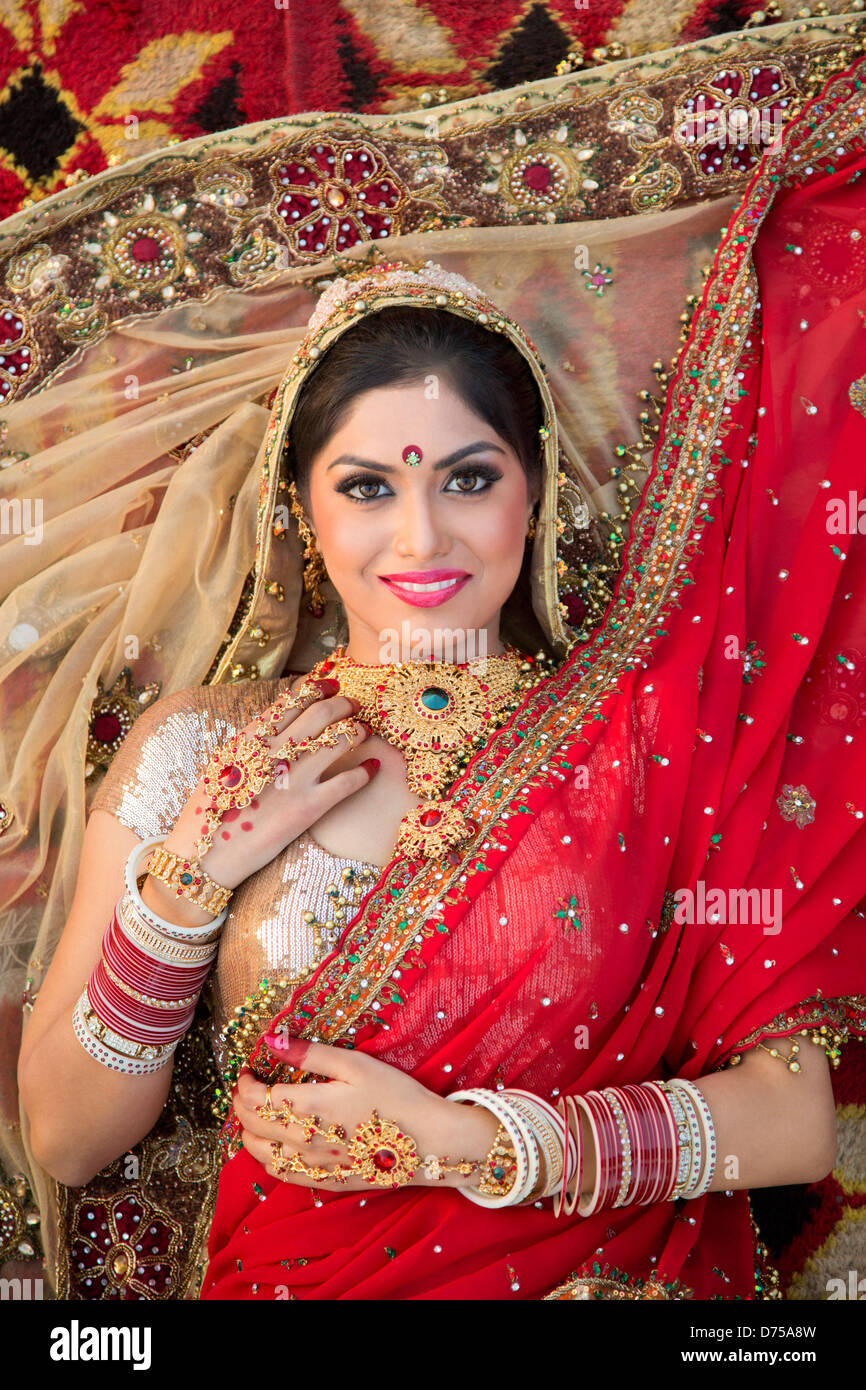 Beautiful Indian bride in traditional wedding dress and posing Stock ...