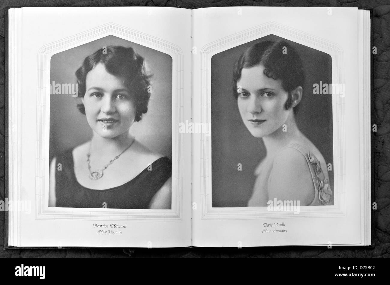 Two beautiful women in a vintage yearbook album. Stock Photo