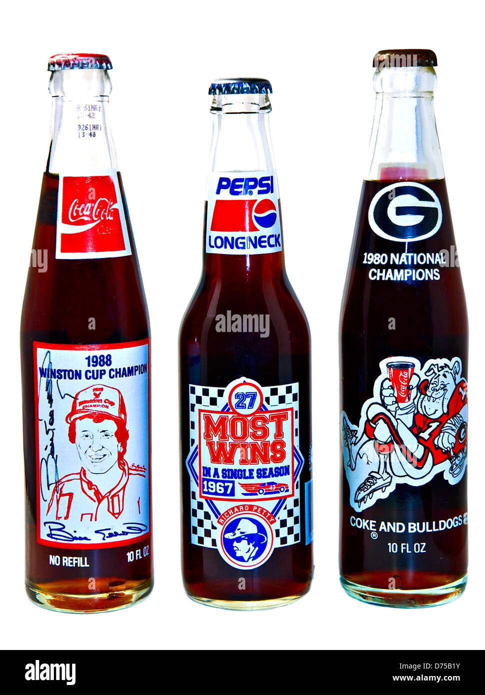 Collectible cola bottles advertising football and race cars. Stock Photo