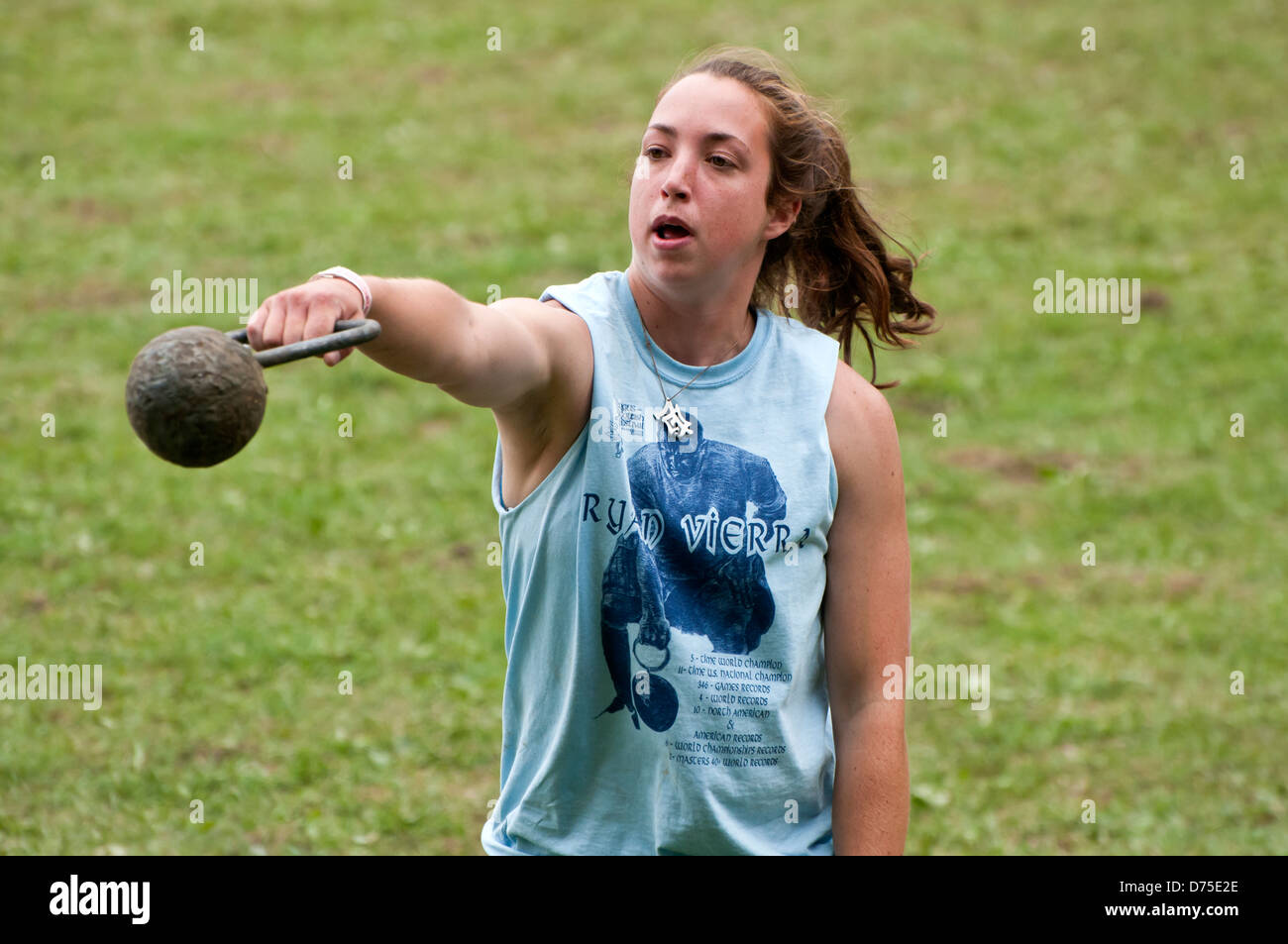 Woman weight throw event in Scottish Highland games Stock Photo