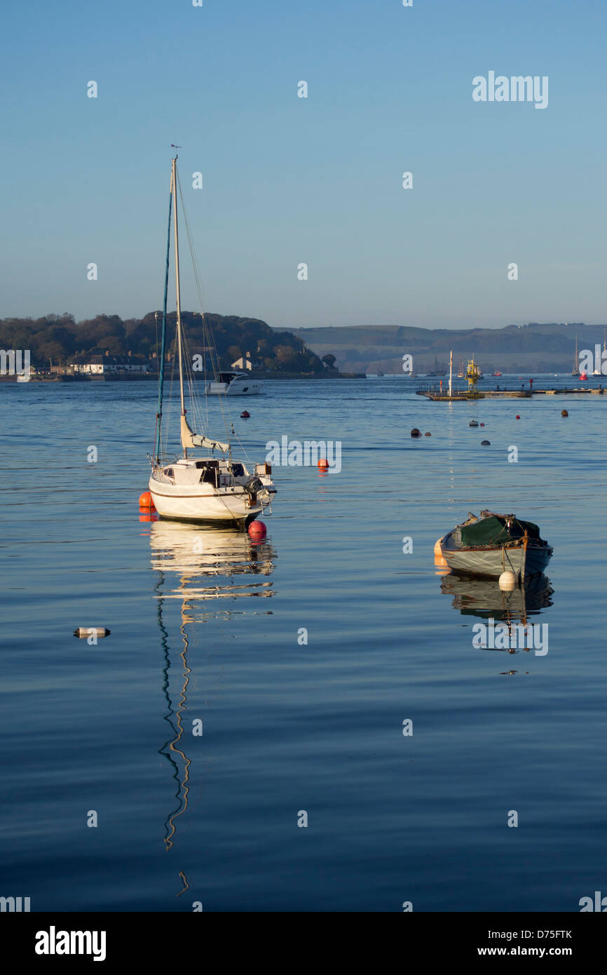 Small boats moored in the river at Cremyll Creek, Plymouth Sound, Devon UK Stock Photo