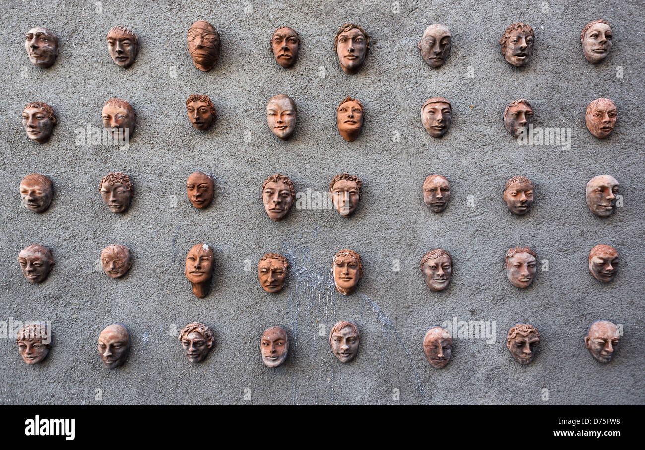 Torre Alfina, Italy, faces made of clay Stock Photo