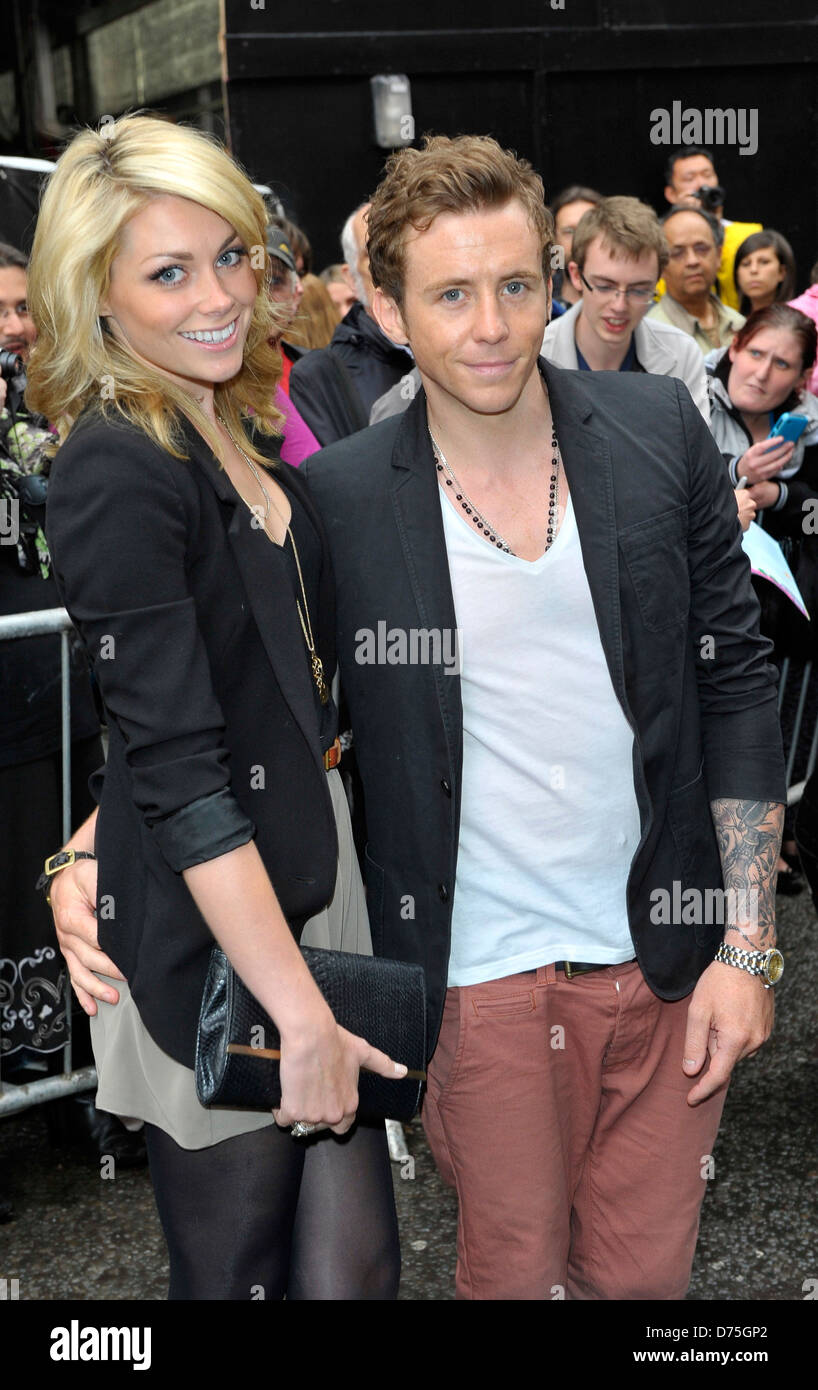 Guest and Danny Jones of McFly press night for 'Ghost: The Musical' held at Piccadilly Theatre - Arrivals London, England - Stock Photo