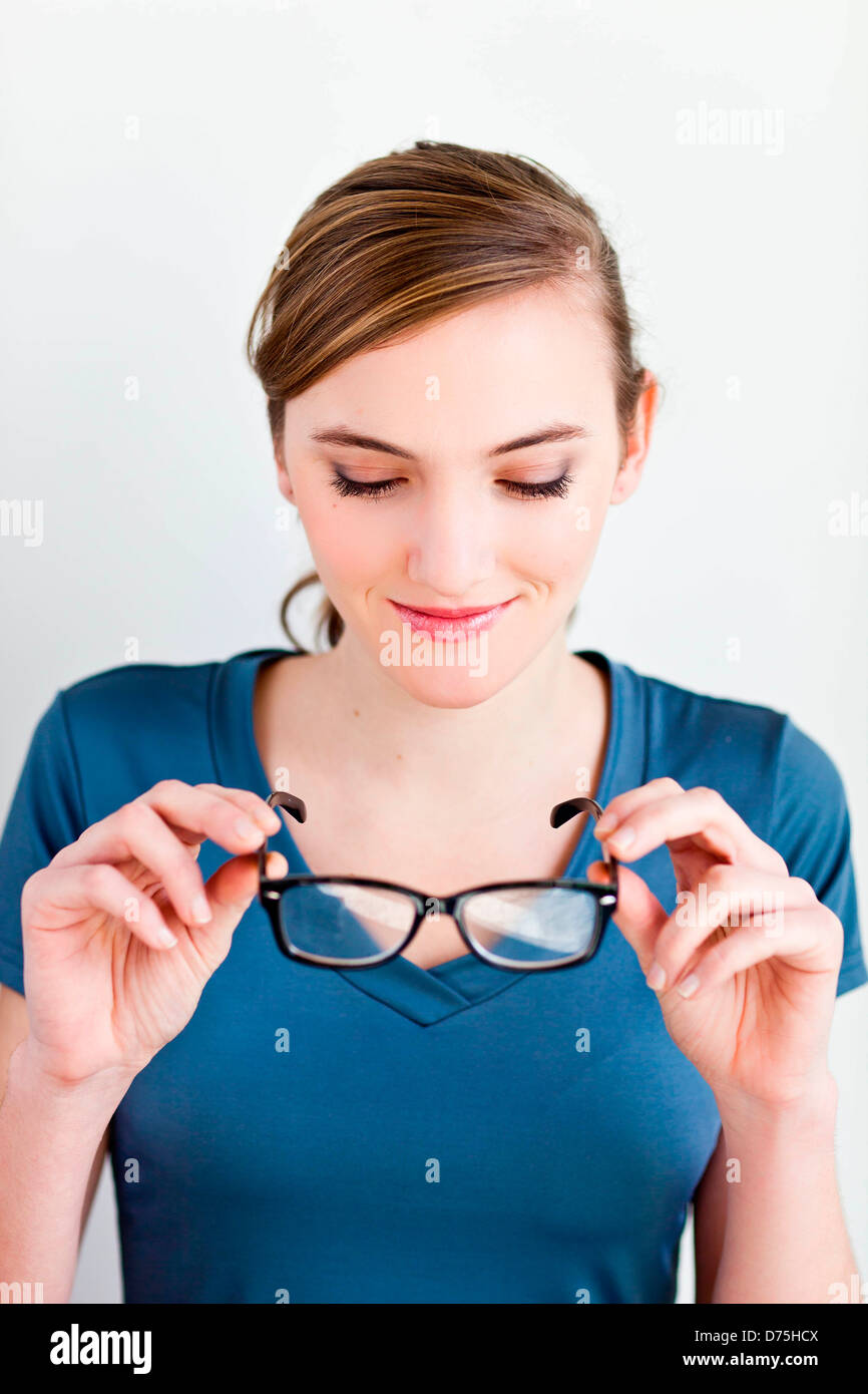 woman holding glasses Stock Photo Alamy