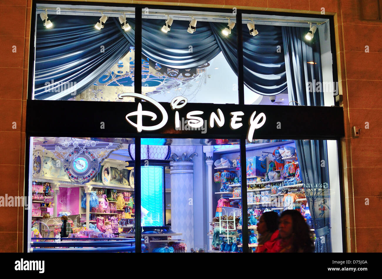 Disney shop on the Champs Elysees at night Paris Stock Photo