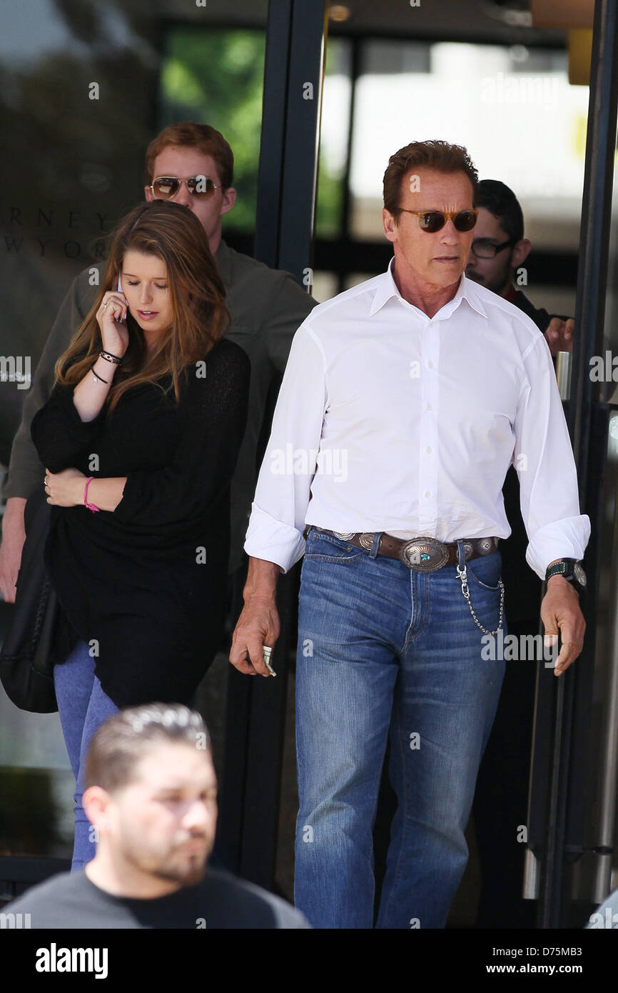 Arnold Schwarzenegger and his daughter Katherine Schwarzenegger depart