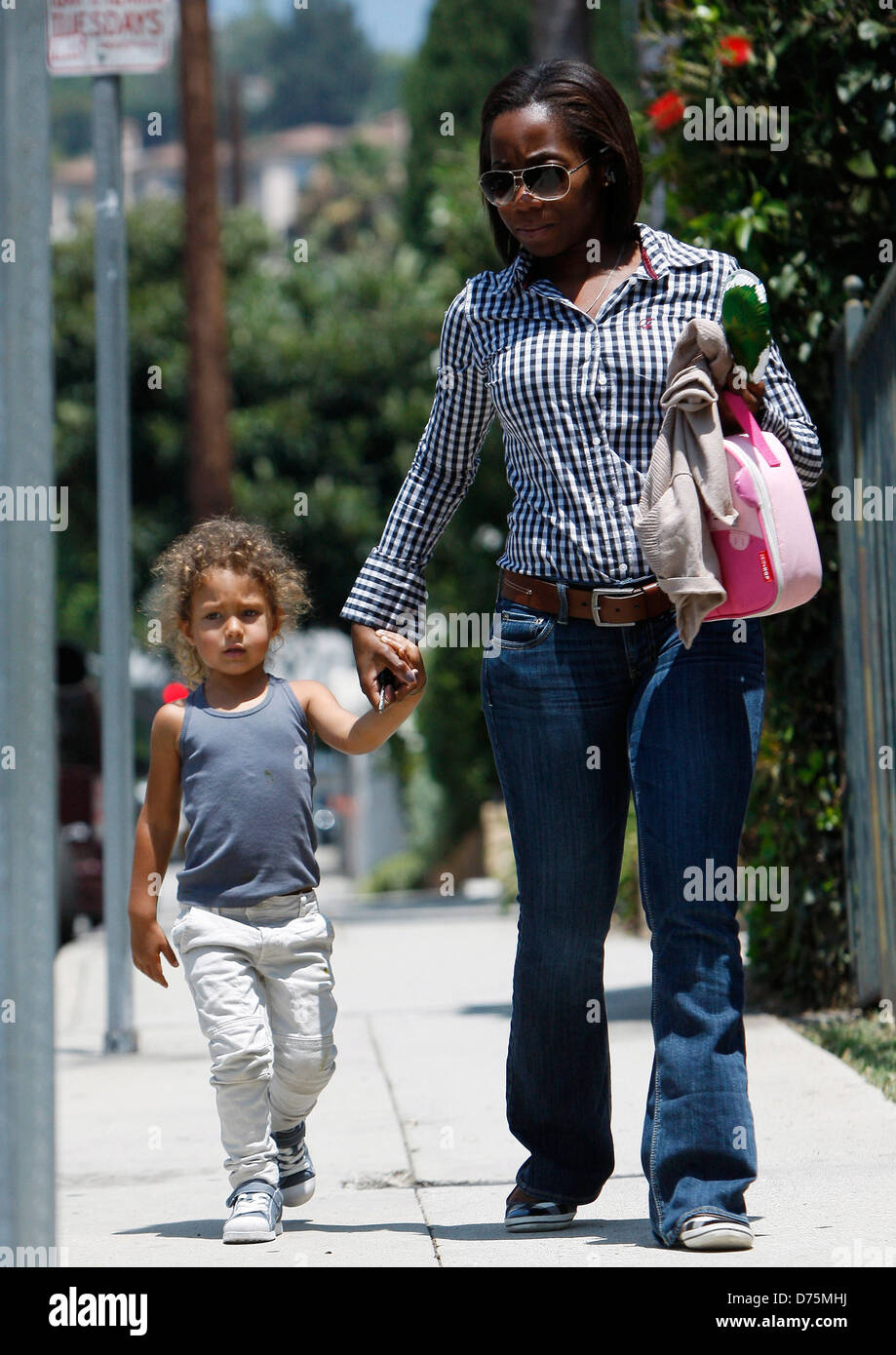 Halle Berry S Daughter Nahla Aubry Is Seen Leaving Pre School With Her Nanny Los Angeles California 08 08 11 Stock Photo Alamy