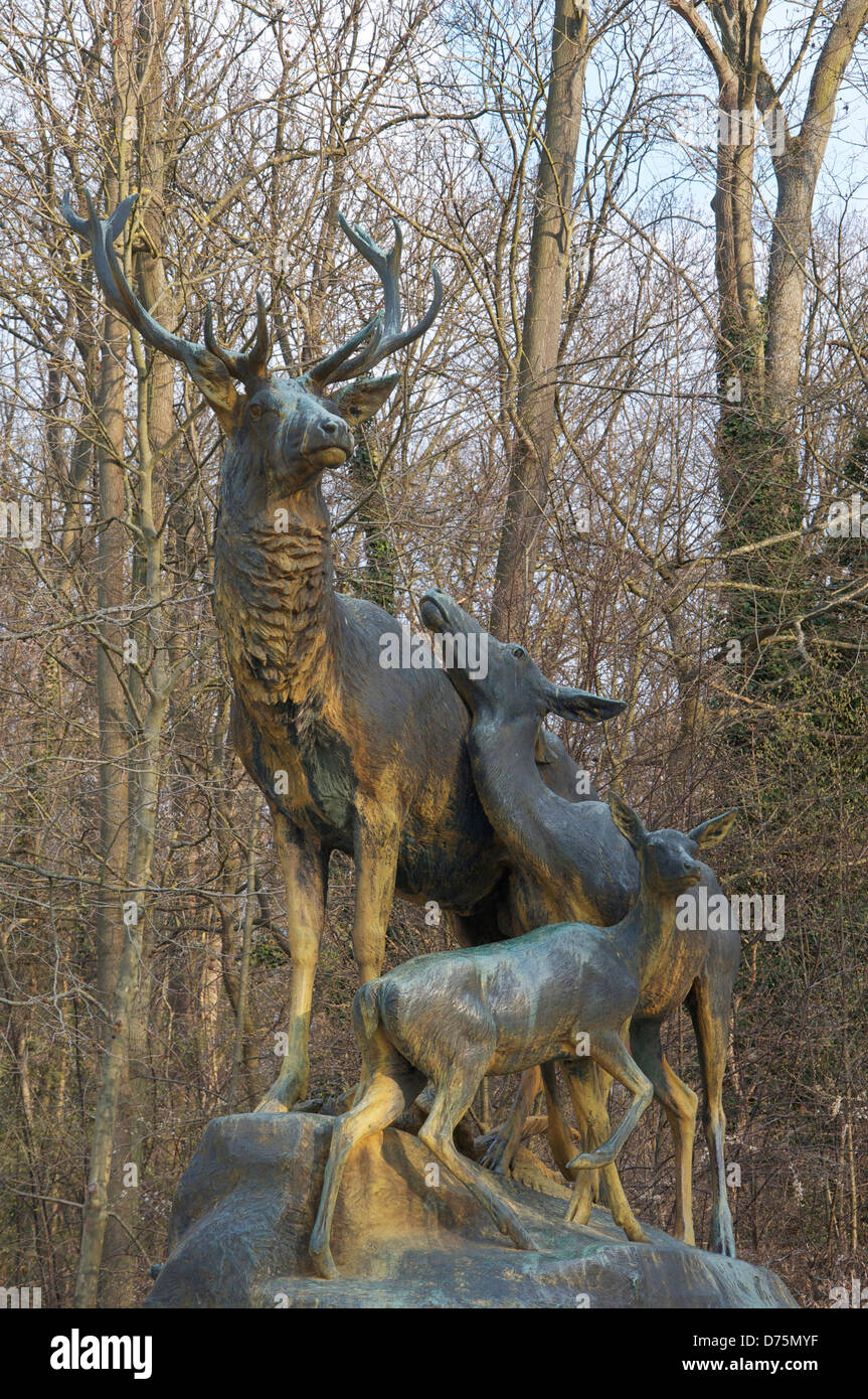 A Large bronze sculpture of a stag with his doe and a fawn, by the sculptor George Gardet, in the Parc de Sceaux. South of Paris. France. Stock Photo
