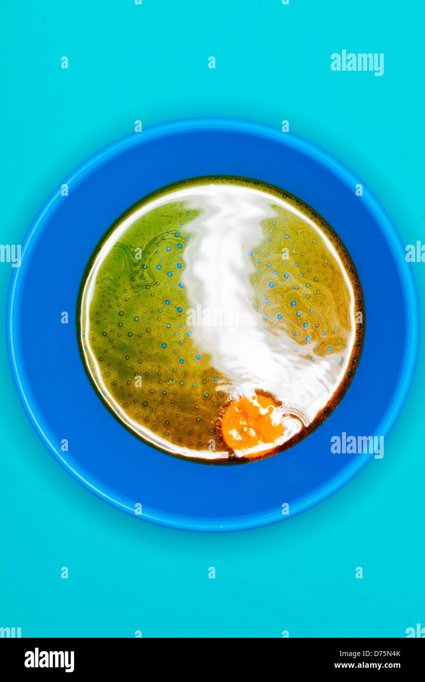 Vitamin C tablet dissolving in a glass of water Stock Photo Alamy