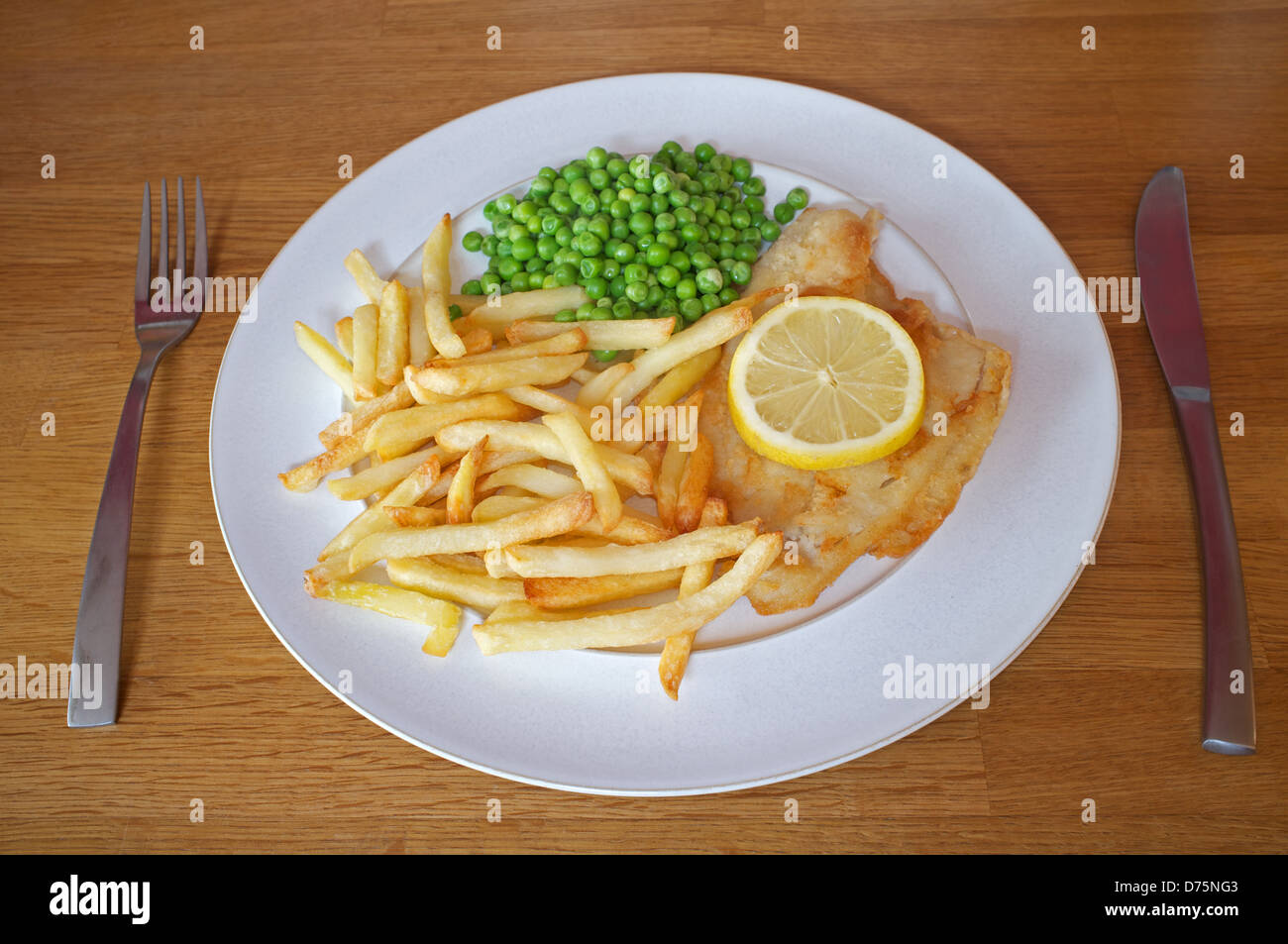 Fish, chips and peas Stock Photo