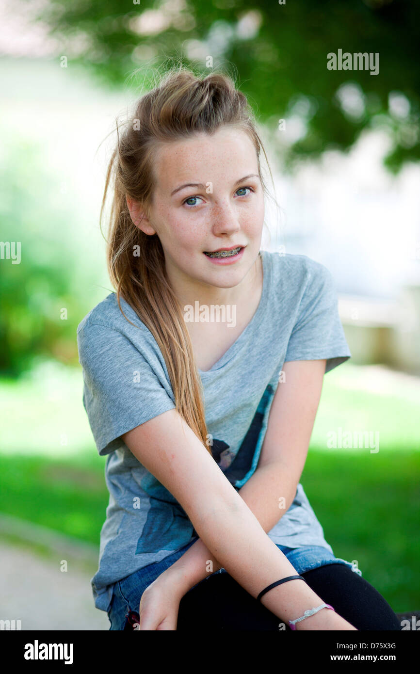 13yearold teenage girl smiling with braces Stock Photo Alamy