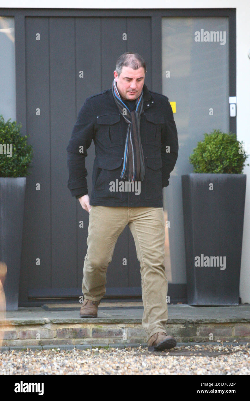 the ex-husband of McLean, looks nervous as he leaves the television presenter's house London, England Stock Photo Alamy