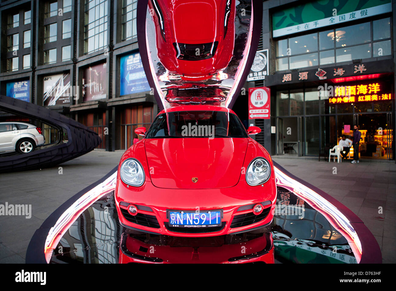 Clamshell Carstands The 'clamshell carstand' by Beijing-based design studio Ballistic Architecture Machine (BAM) provides a Stock Photo