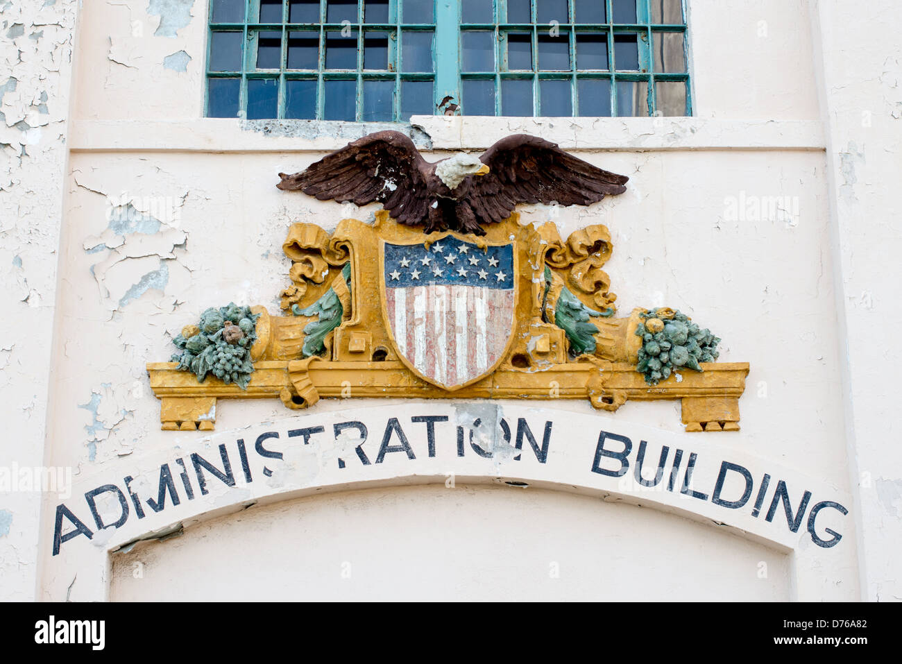 SAN FRANCISCO, California - A sign with a government seal on the Administration Building of Alcatraz. Known for its notorious inmates and rumored inescapability, Alcatraz now serves as a significant tourist attraction and National Park Service site, providing insight into the prison system and historic events of the 20th century. Stock Photo