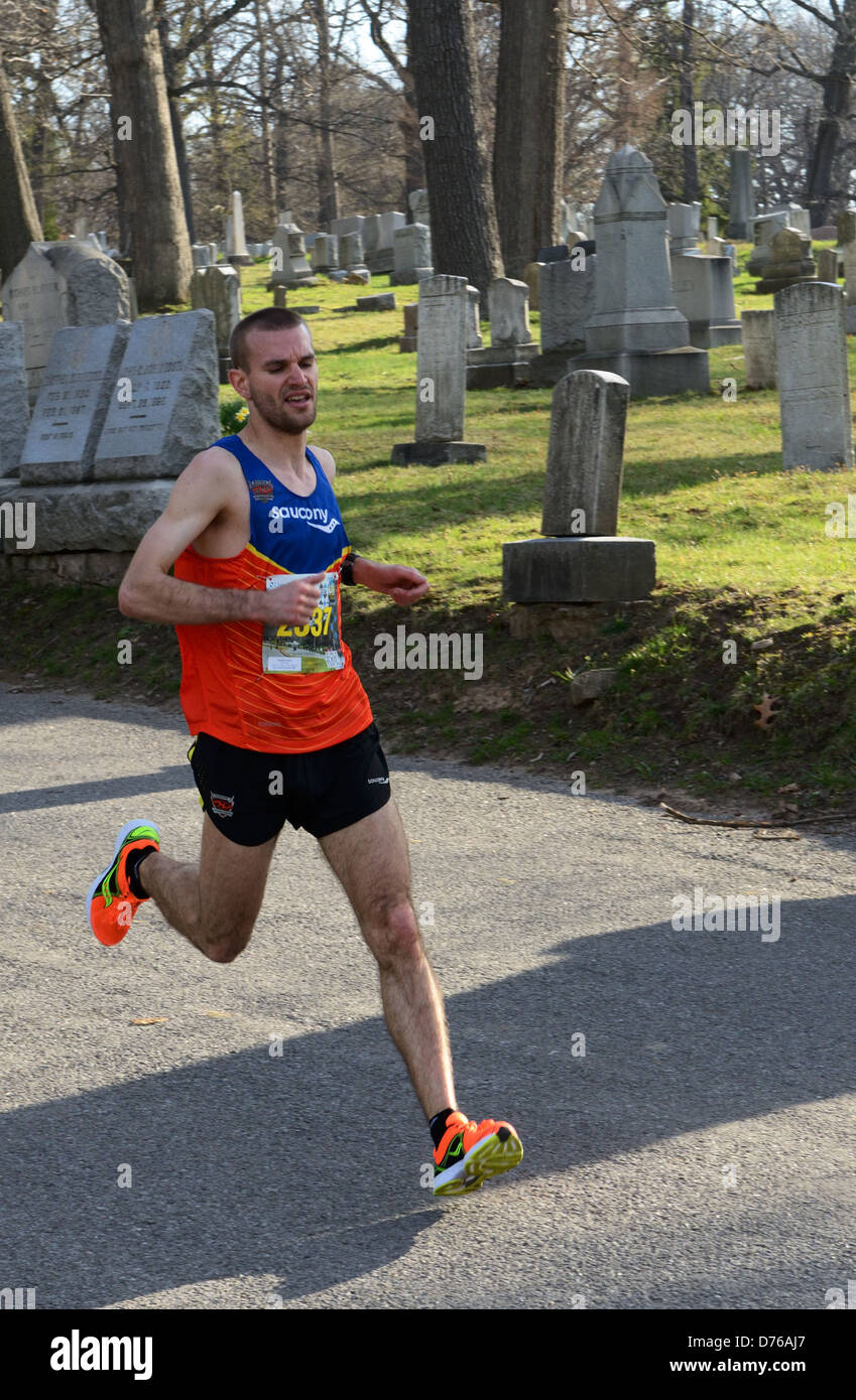 Half Marathon runner races in Rochester, NY Stock Photo Alamy