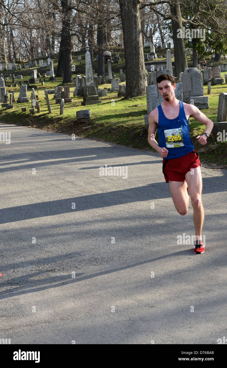 Half Marathon runner races in Rochester, NY Stock Photo Alamy